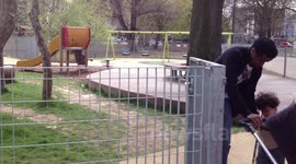 Playgrounds and people chilling around Sheperd's Bush Park