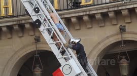 Topless Femen Leader Climbs down ladder into Extreme Right rally in Paris, Police Attacked by Demonstrators