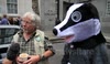Brian May and Bill Oddie lead London protest against badger cull