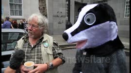 Brian May and Bill Oddie lead London protest against badger cull
