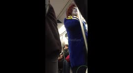 Clown entertains NYC metro commuters