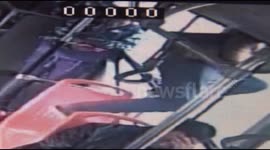 Anxious commuter jumps out of bus window in China