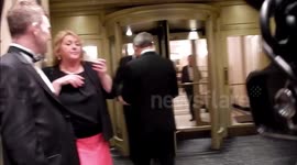 Nigel Farage leaves Mayfair party