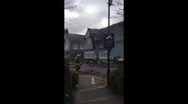 Fire fighters tackle blaze at Bicester Village, UK