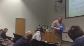 Good-humoured teacher pelted by dodgeballs in college class