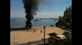 Boat fire leads to beach evacuation in Cascais, Portugal
