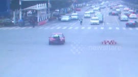 Unlicensed driver carries policeman on bonnet of car