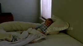 My little girl pretends to sleep like Daddy