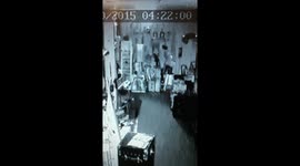 slow motion ghost pushing heavy lamp off the table