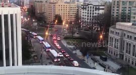 Buses of NYPD officers arrive in Washington, D.C. to help security for Inaugurations Day