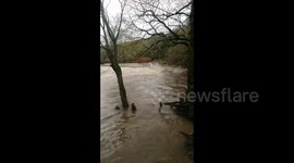 River Goyt swells as Storm Christoph prompts flood warnings in northern England