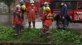 Rescue team search for missing person after Bolivia river overflows due to heavy rain
