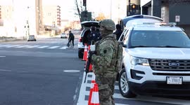 Washington, DC: National Guard troops and other military personnel secure streets and checkpoints on eve of inauguration