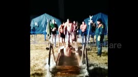 Watch Russians get baptised in -23C water while celebrating Epiphany