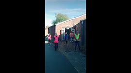 Drive thru foodbank team do viral dance, led by the vicar