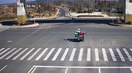 Out-of-control three-wheeler does doughnuts on road after being hit by car in China