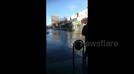 London street submerged after water main bursts