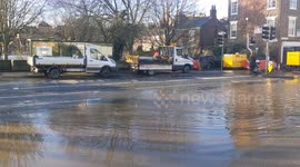 Cars driving through floodwater as the council continue to defend against the flood. Tower Street, York 21.01.2021
