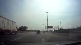 Female motorcycle rider smashes through toll road barrier