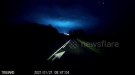 Dashcam catches strange multicoloured lights flashing in French sky