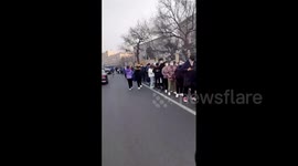 Thousands of people line up for COVID-19 tests in Beijing