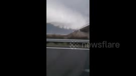 Spain: Apocalyptic Arcus Cloud Looms Over Lleida During Storm