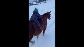 Adorable 2years old ride a horse with her cat!