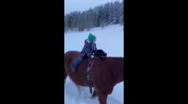 Little 2years old adroably rides a horse with her cat!