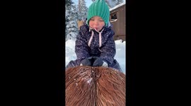Adrable 2years old plays on her little ponny in snowy wonderland in Slovakia!