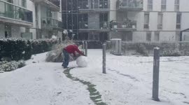 Children enjoy snow in London amid weather warning for much of UK