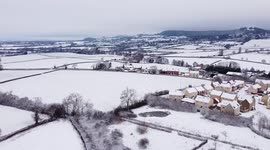 Snowfall over Gloucestershire and the southern edge of the Cotswold Escarpment