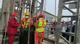Rescuers haul 11 of 22 trapped Chinese miners from gold mine