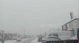 Snow falls in London as temperatures plunge