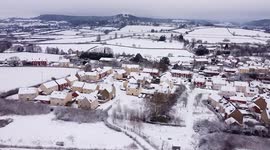Drone footage shows beauty of English village blanketed in snow