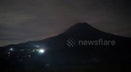 Short Timelapse Mount Sinabung emits incandescent lava at midnight
