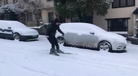 Ski Sunday! Man filmed skiing down street in Wiltshire in UK