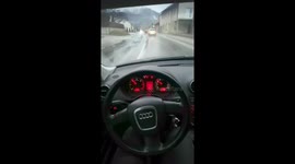 A Bosnian man drives a car with his legs