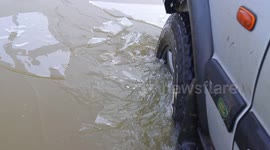 Land Rover smashes through ice during Storm Christoph floods in Yorkshire