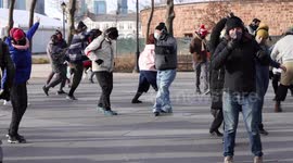 New York: Dancers groove in near-silence in NYC park as frigid temperatures chill Manhattan
