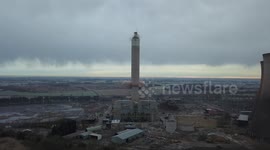 Dramatic footage shows 180ft chimney at Rugeley Power Station being demolished in controlled explosion