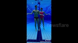 Artistic swimming duo perform TikTok challenges under water