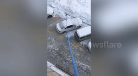 Chinese resident on coronavirus lockdown walks dog from third-floor window using long leash made of clothes