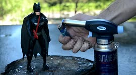 YouTuber puts Batman toy and Snickers bar up against blowtorch in fiery experiment