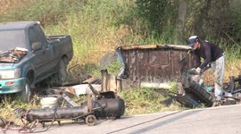 Dangerous work practices, a man using a metal grinder without wearing goggles gets a spark into his face close to his eye, and starts coughing.