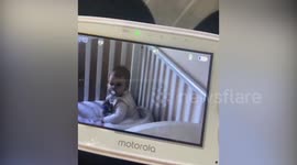 Hilarious footage shows moment crafty baby pretends to be asleep