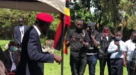 Former presidential candidate Bobi Wine addresses media after Uganda ends house arrest