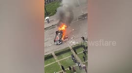 Car burns during anti-lockdown protest in Eindhoven, Netherlands