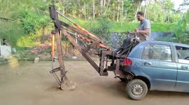 Indian scientist transforms his old car into functioning digger