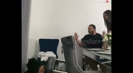 US man has hilarious reaction to his friend falling over his chair