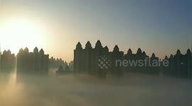 High-rise buildings poke out from blanket of heavy fog in northern China